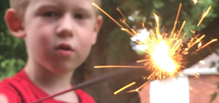 young boy with sparkler